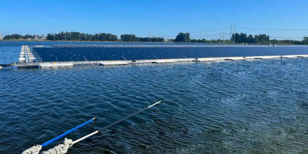 Floating solar farm secured using advanced mooring techniques, ensuring stability on water against wind and currents.