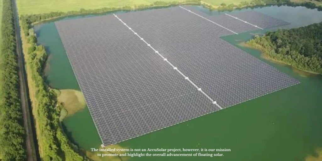 Aerial view of a large floating solar panel installation on a reservoir demonstrating how texas solar incentives can be applied to water-based renewable energy systems