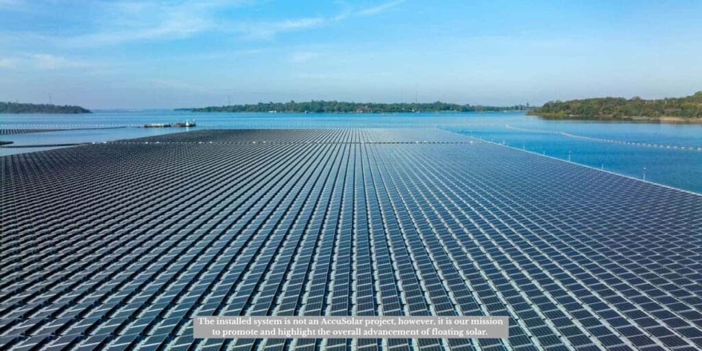 Floating solar panels on a lake illustrating what is the albedo effect by showing how reflective surfaces reduce solar heat absorption on water.