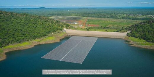 Aerial view of a reservoir showing Evaporation Examples with floating solar panels reducing water loss on the water surface