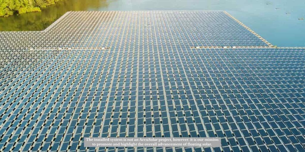 Floating solar array showing how do solar panels work by converting sunlight into electricity on water mounted platforms