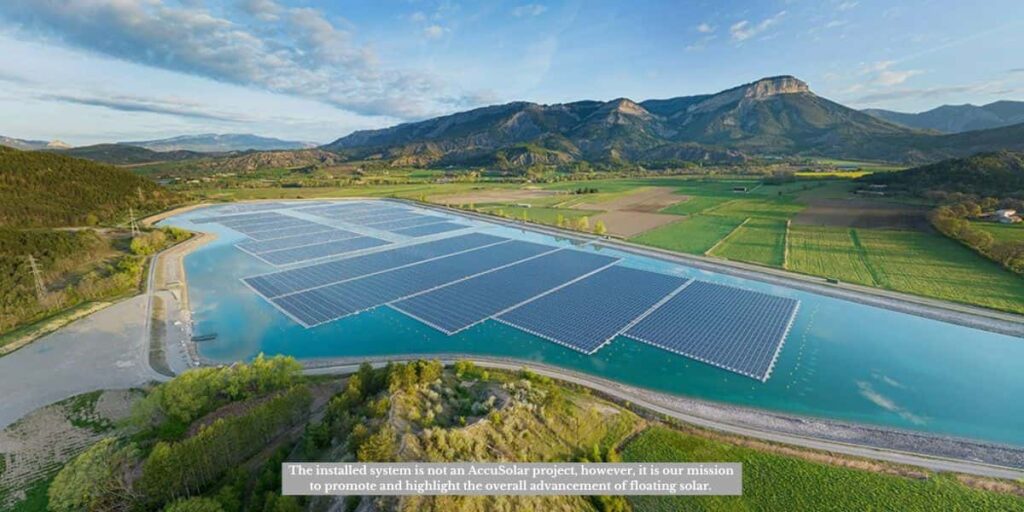 Aerial view of a reservoir showing what is one way people positively affect water resources? through floating solar panels reducing evaporation and improving water quality